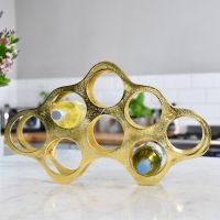 Gold "Cloud" Wine Rack on Kitchen Counter 