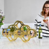 "Cloud" Wine Rack in Gold Finish in Kitchen Setting 