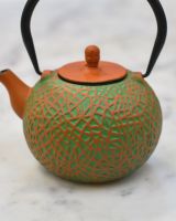 Close up of "Sarda" Green and Orange Cast Iron Japanese Style Teapot detailing