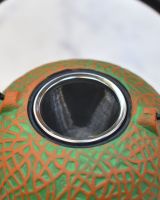 Close up of "Sarda" Green and Orange Cast Iron Japanese Style Teapot strainer
