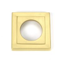 Close-Up of Square Backplate for Satin Brass "Royale" Square Unsprung Door Handle on Rose Set Close-Up of Square Backplate for Satin Brass "Royale" Square Unsprung Door Handle on Rose Set