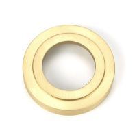 Close-Up of Backplate for Satin Brass "Royale" Unsprung Art-Deco Door Handle on Rose Set