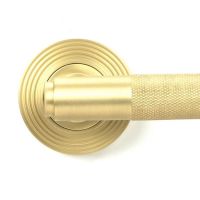 Close-Up of Satin Brass "Royale" Unsprung Beehive Door Handle on Rose Set Close-Up of Satin Brass "Royale" Unsprung Beehive Door Handle on Rose Set