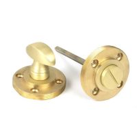 Close-Up of Set of Satin Brass Beehive "Vienna" Round Bathroom Thumb Lock