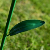 Close up of metal leaf on sunflower outdoor ornament Close up of metal leaf on sunflower outdoor ornament