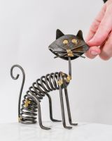 Scale image of sitting cat scrap metal art sculpture