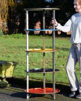 ‘Orbit’ Upcycled Oil Drum shelving Unit with lady stood to the side to reference scale