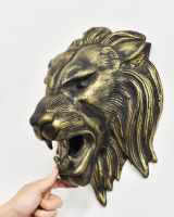 Scale image of black and gold lion head wall bust