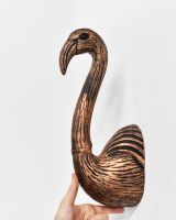 Scale image of copper animal wall bust