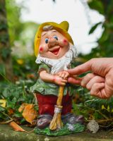 Scale image of colourful garden gnome statue Scale image of colourful garden gnome statue