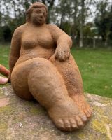 Scale image of rustic finish cast iron garden sculpture