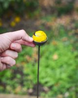 Scale image of marble sunflower plant pot stake