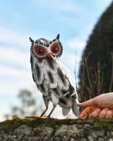 Scale image of colourful steel owl garden ornament