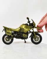 scale image of scrap metal adventure bike sculpture