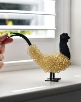 Scale image of recycled cockerel sculpture