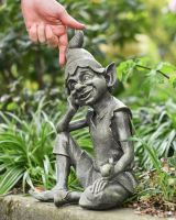 scale of sitting pixie garden statue