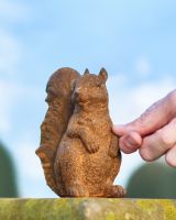 Scale image of rustic finish cast iron patio ornament