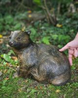 Scale image of brushed gold badger garden sculpture