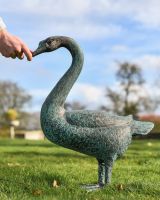 Scale image of swan sculpture
