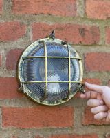 Scale Of The Antique Brass Nautical Round "Cosby" Bulkhead Wall Light