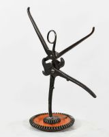 Scrap Metal Ballerina Sculpture side view Scrap Metal Ballerina Sculpture side view