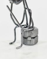 Close up of Phone Call Sitting Scrap Metal Ornament base