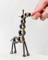 Scale image of "Yster" The Scrap Metal Giraffe Sculpture