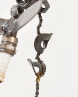 Close up of Spark Plug Hummingbird Recycled Metal Ornament stem Close up of Spark Plug Hummingbird Recycled Metal Ornament stem