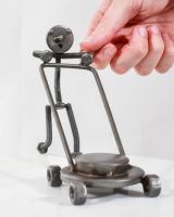 Scale image of Mowing Scrap Metal Sculpture