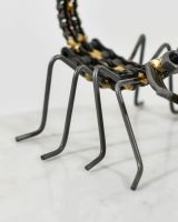 Close up of "Skorpios" The Scorpion Scrap Metal Sculpture legs