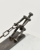 Close up of "Tug Of War" Scrap Metal Sculpture detailing