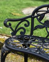 Scroll Arm Rest on Black Metal Bench 