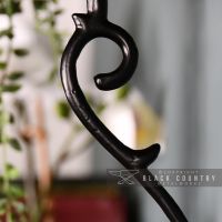 Close-up of the Black Scroll Design