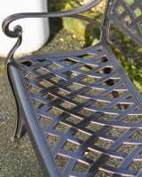 Lattice design on copper bench 