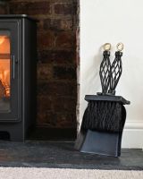 The "Dudley" Pan & Brush Set Displayed next to some logs by a Log Burner Stove - Digital Illustration 