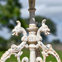Serpent Design on the Cast Iron Side Table Serpent Design on the Cast Iron Side Table