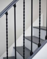 Close- Up of Set of 2 Matte Black "Enfield" Steel Stair Spindles - Pattern 11 Close- Up of Set of 2 Matte Black "Enfield" Steel Stair Spindles - Pattern 11
