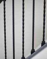 Close-Up Shot of Pair of Alternating Stair Spindles Close-Up Shot of Pair of Alternating Stair Spindles