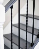 Close-Up of Set of 2 Matte Black "Enfield" Steel Stair Spindles - Pattern 11 in Situ Close-Up of Set of 2 Matte Black "Enfield" Steel Stair Spindles - Pattern 11 in Situ