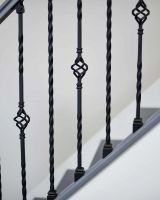 Close-Up of Set of 2 Matte Black "Enfield" Steel Stair Spindles - Pattern 13