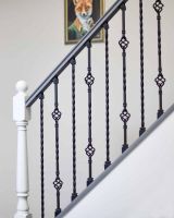 Set of 2 Matte Black "Enfield" Steel Stair Spindles - Pattern 14 in Situ