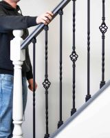 Scale Shot of Set of 2 Matte Black "Enfield" Steel Stair Spindles - Pattern 5