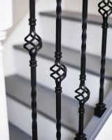 Close-Up of Set of 2 Matte Black "Enfield" Steel Stair Spindles - Pattern 6 in Situ Close-Up of Set of 2 Matte Black "Enfield" Steel Stair Spindles - Pattern 6 in Situ