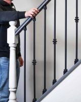Scale Shot of Set of 2 Matte Black "Enfield" Steel Stair Spindles - Pattern 8