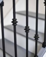 Close-Up of Set of 2 Matte Black "Enfield" Steel Stair Spindles - Pattern 9