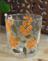 Close up of textured glass floral jar