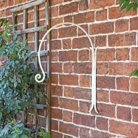 "Shepherds Crook" Hanging Basket Wall Bracket in the Garden "Shepherds Crook" Hanging Basket Wall Bracket in the Garden