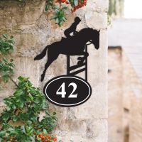Bespoke Showjumping Horse Iron House Number Sign on a Garden Wall