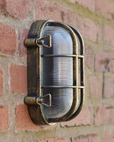 Side view of marina antique brushed brass garden wall light