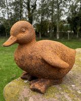 Angled view of rustic finish duck outdoor statue